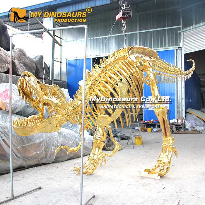 Hanging-golden-t-rex-skeleton